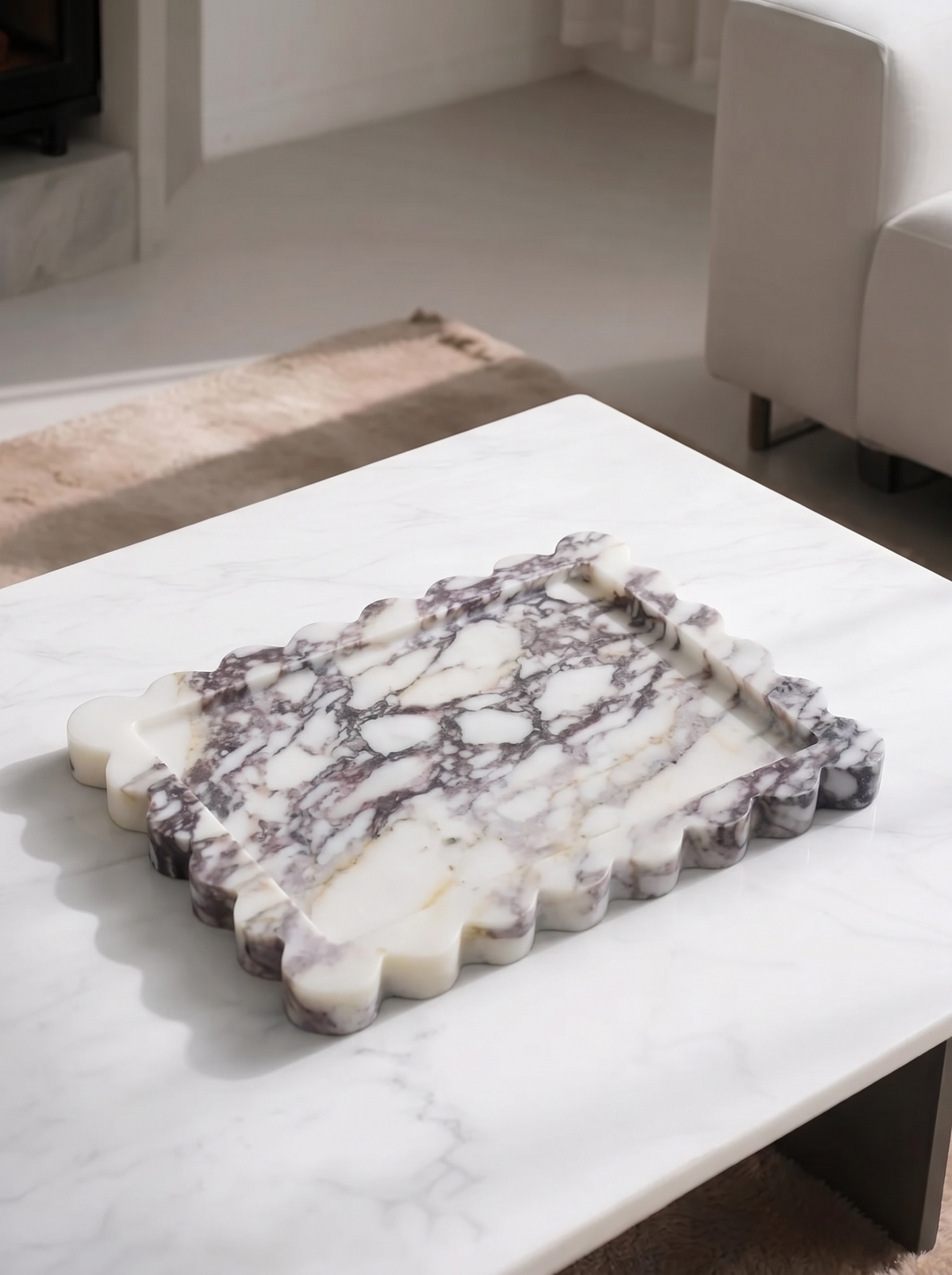 Close view of a scalloped violet marble tray