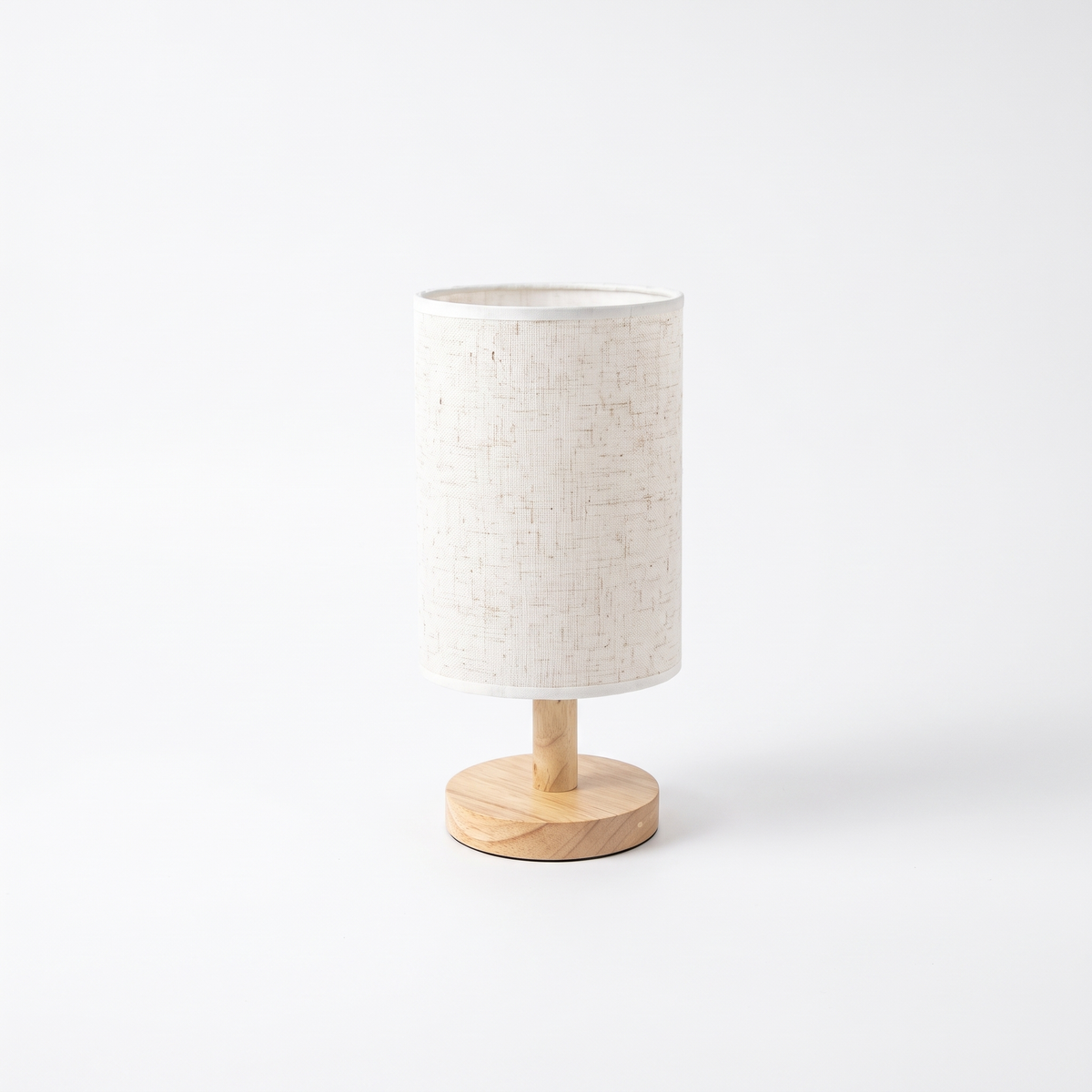 Japandi linen drum table lamp – White Linen, on a white background