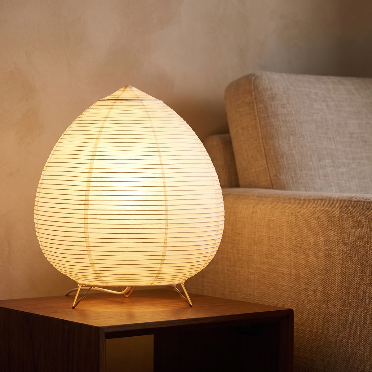 Rice paper lantern table lamp displayed in a warm modern interior