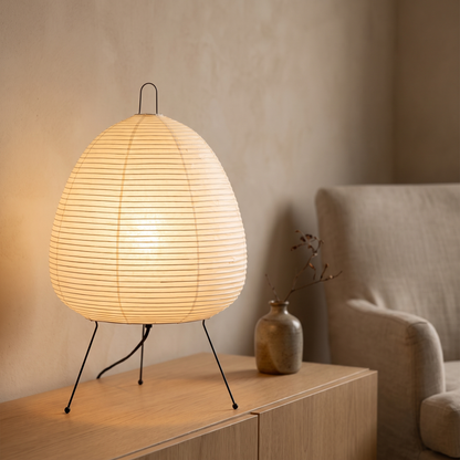 Wabi-sabi rice paper lantern table lamp displayed in a warm modern interior